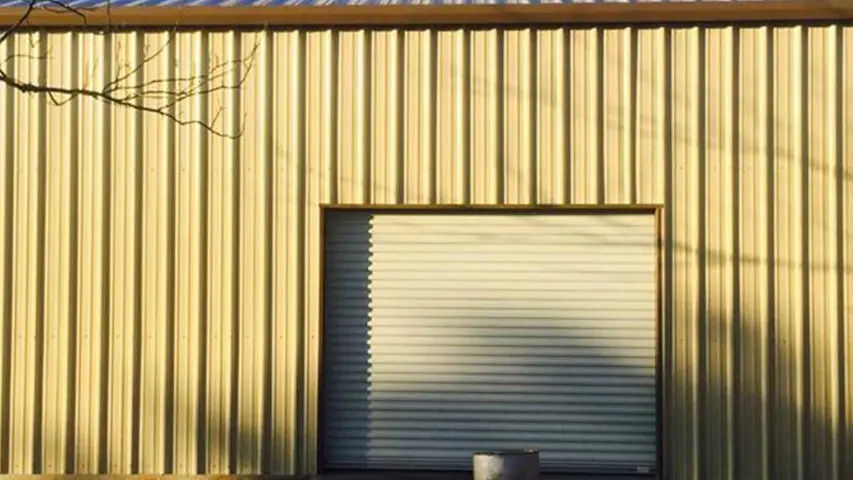 Metal Building Exterior with Roll-Up Garage Door