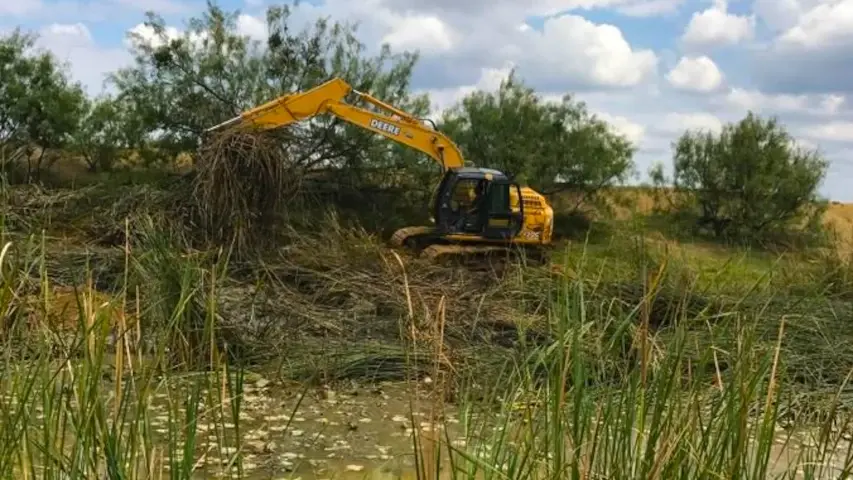 Land clearing tank