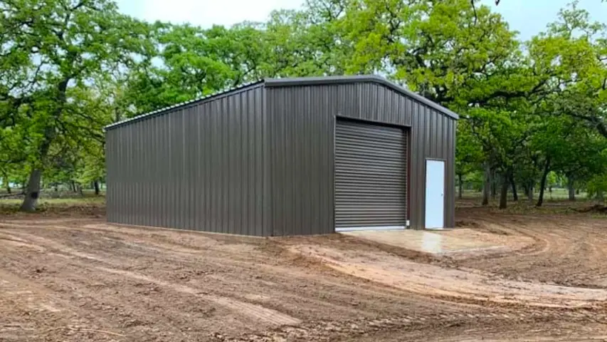 Metal Building with Roll-Up Garage Door and Entrance