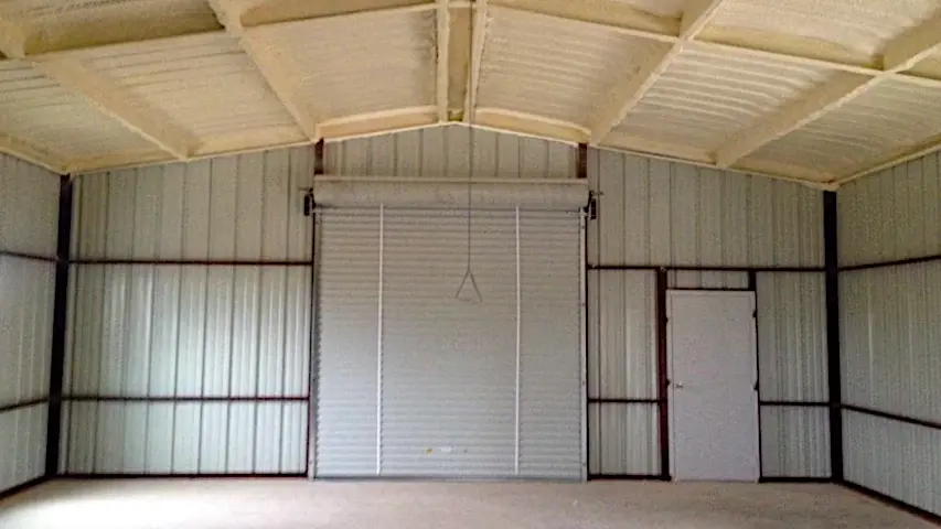 Metal Building Interior with Roll-Up Garage Door