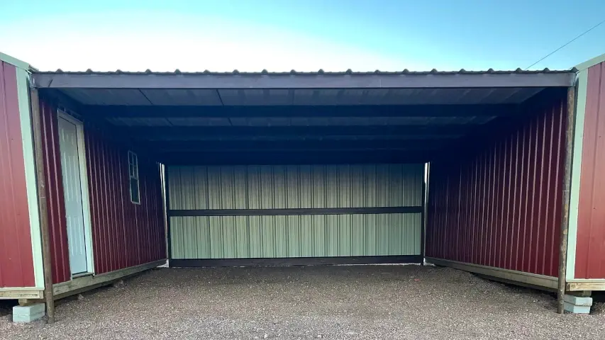 Metal building livestock housing