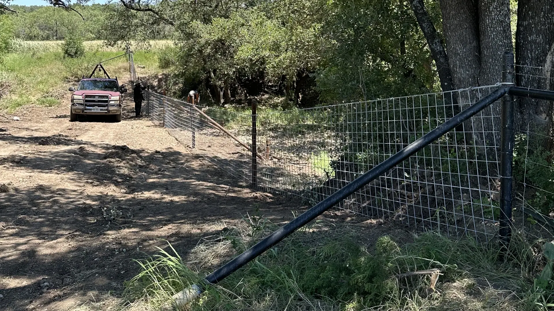 Texas ranch fence water gap design